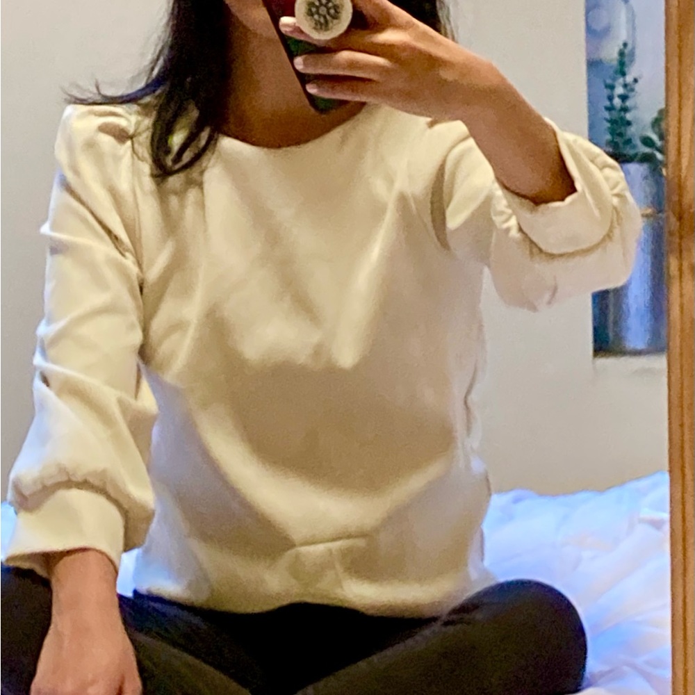 Cream-colored blouse